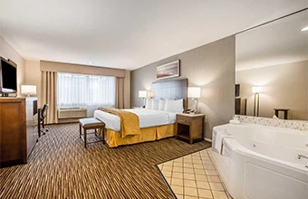 a hotel room with two beds