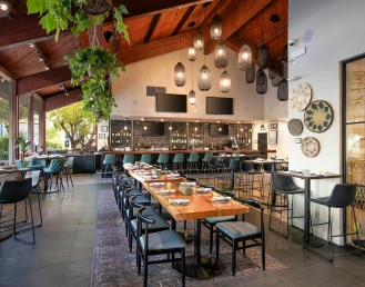 a restaurant with tables and chairs