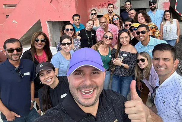 a group of people posing for a photo