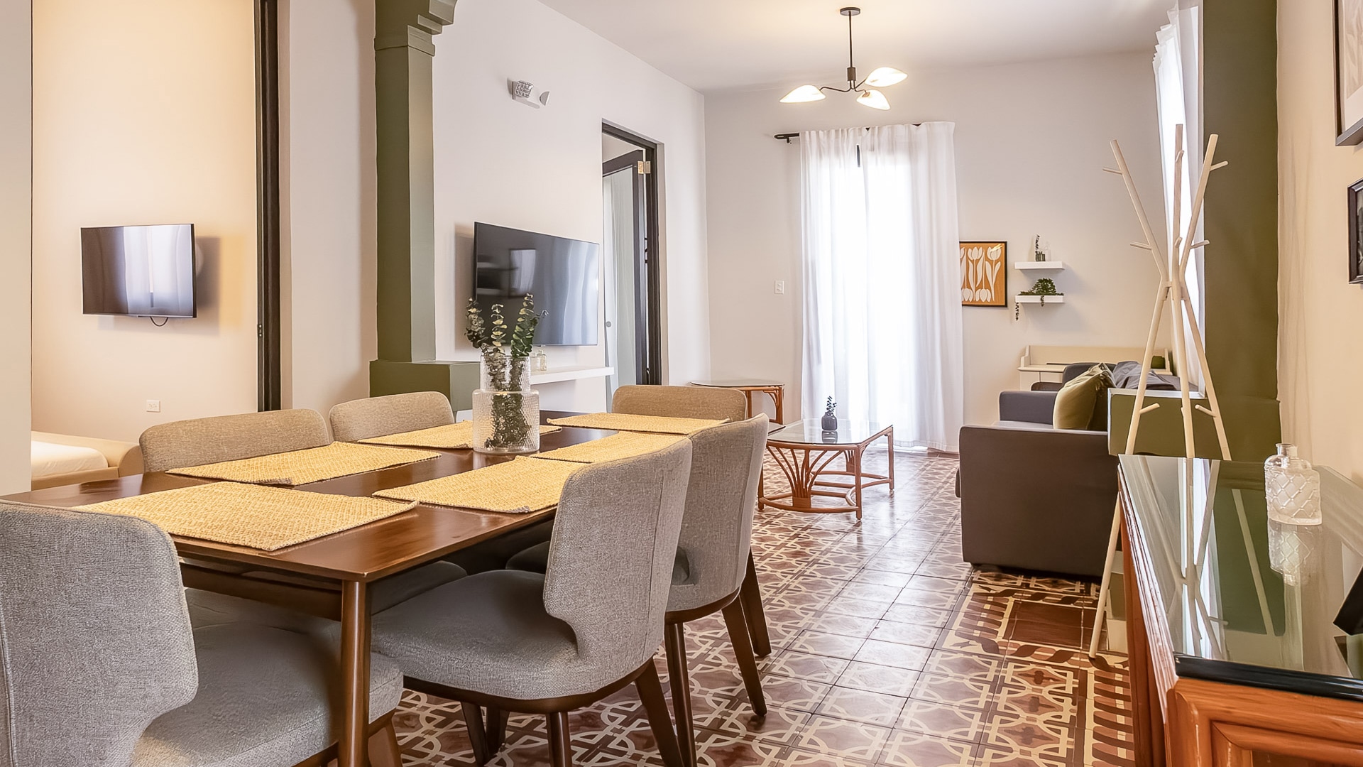 a dining room with a table and chairs
