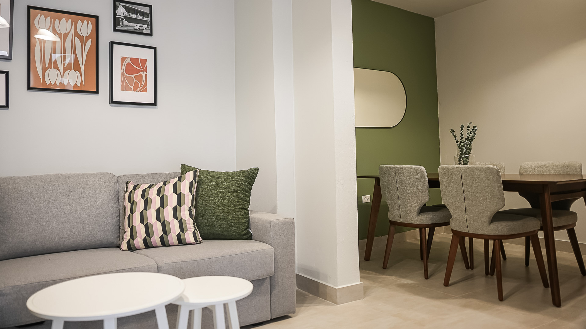 a living room with a couch and table