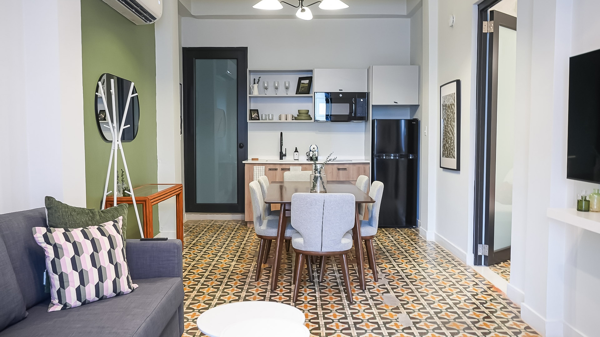 a dining table and chairs in a room