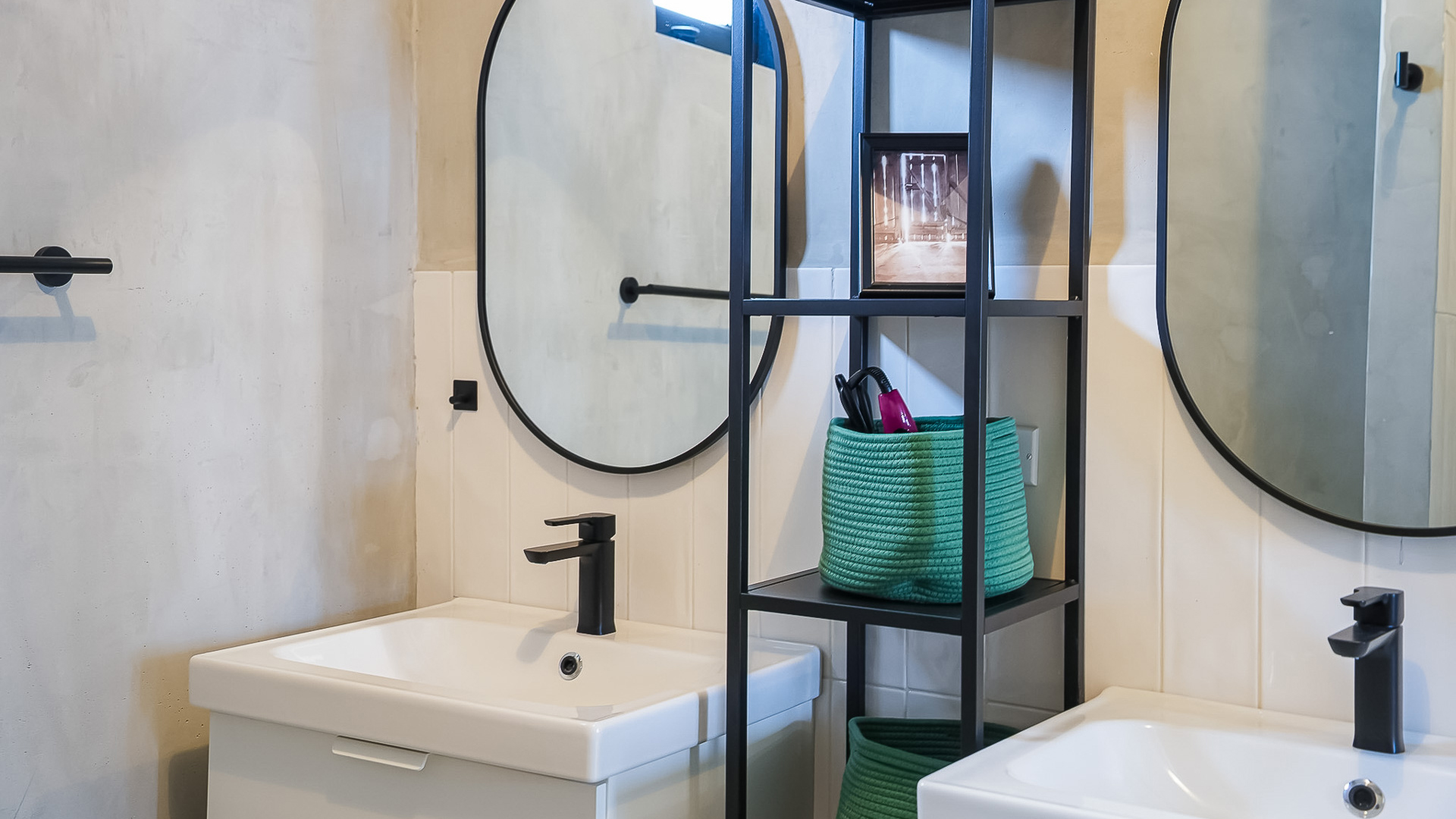 a bathroom with a mirror and a shelf