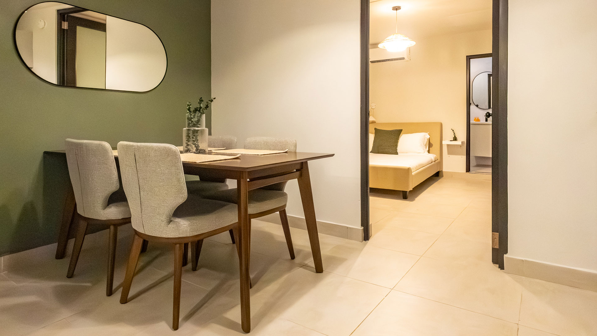 a room with a table and chairs