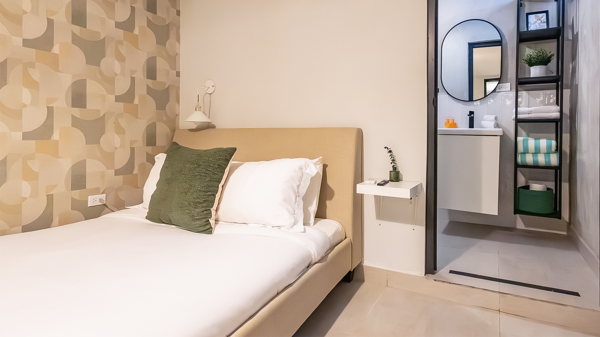 a bed with a white bed and a white bed frame