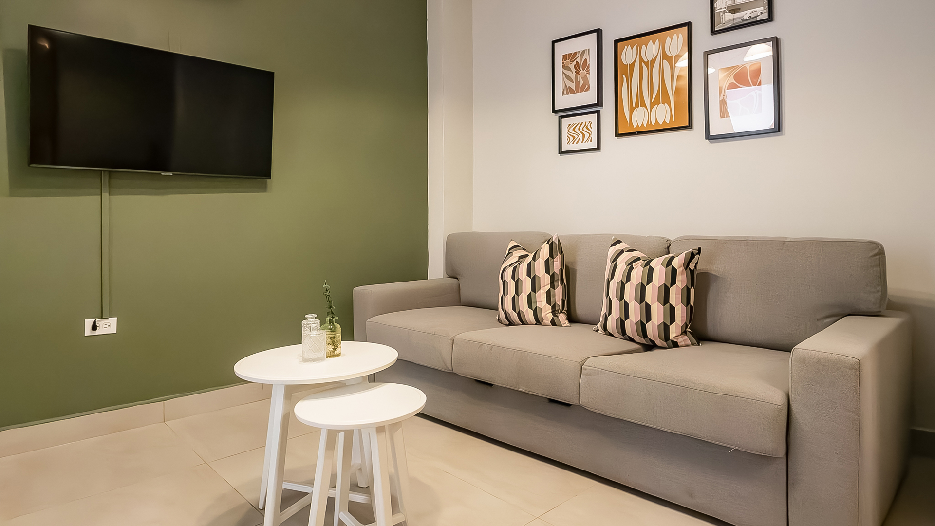 a couch with pillows in a room