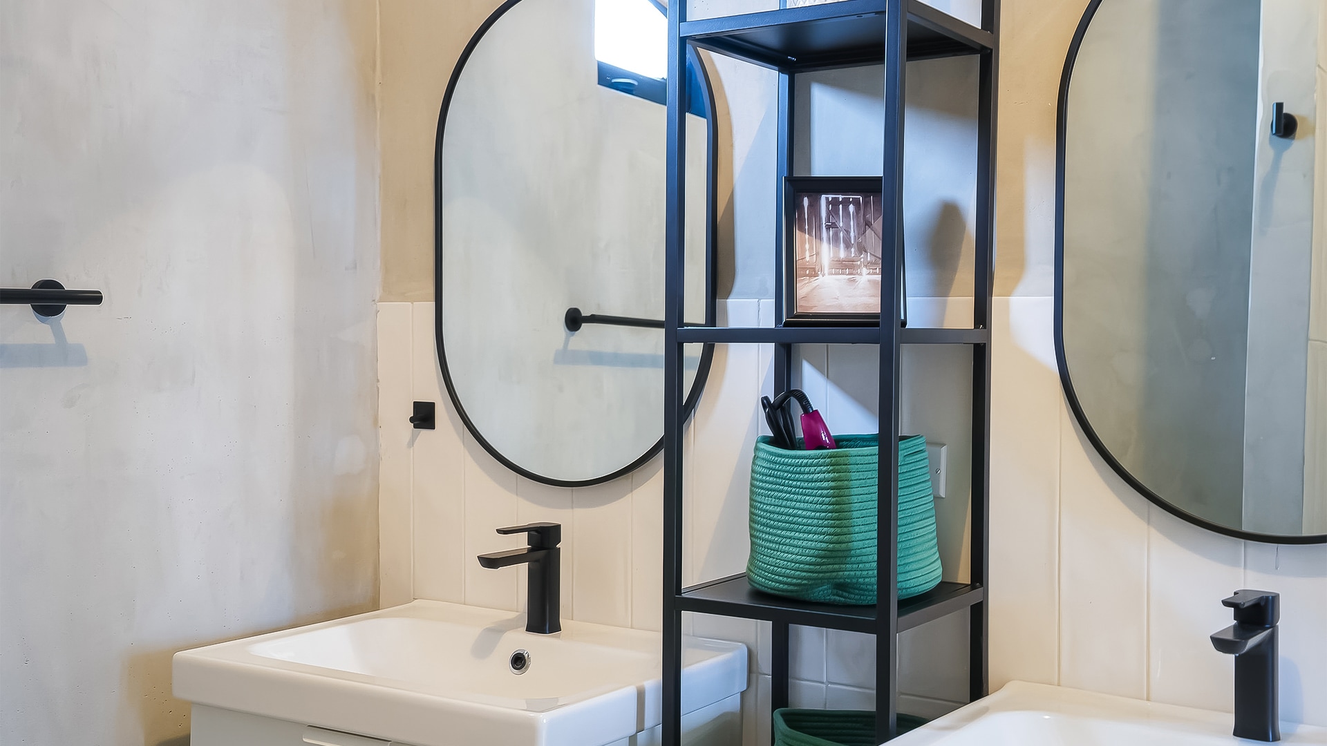 a bathroom with a mirror and a shelf