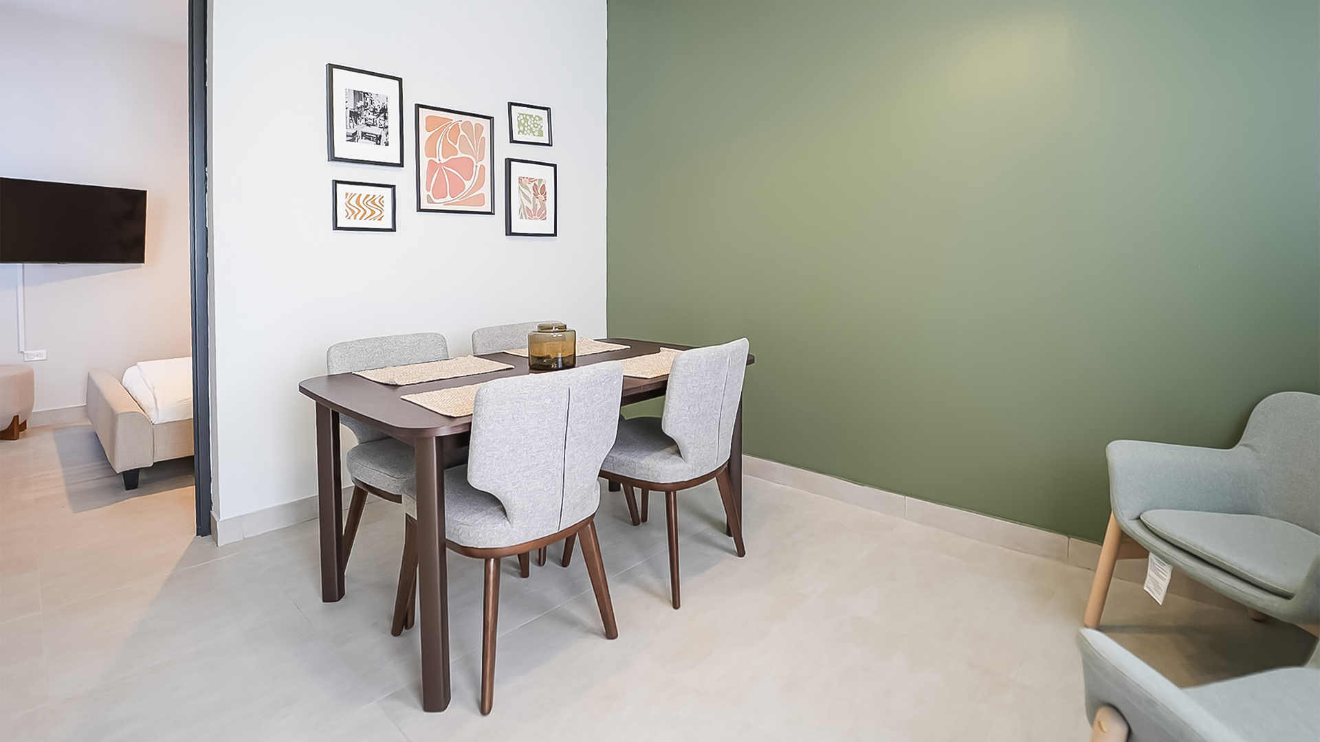 a dining table with chairs in a room