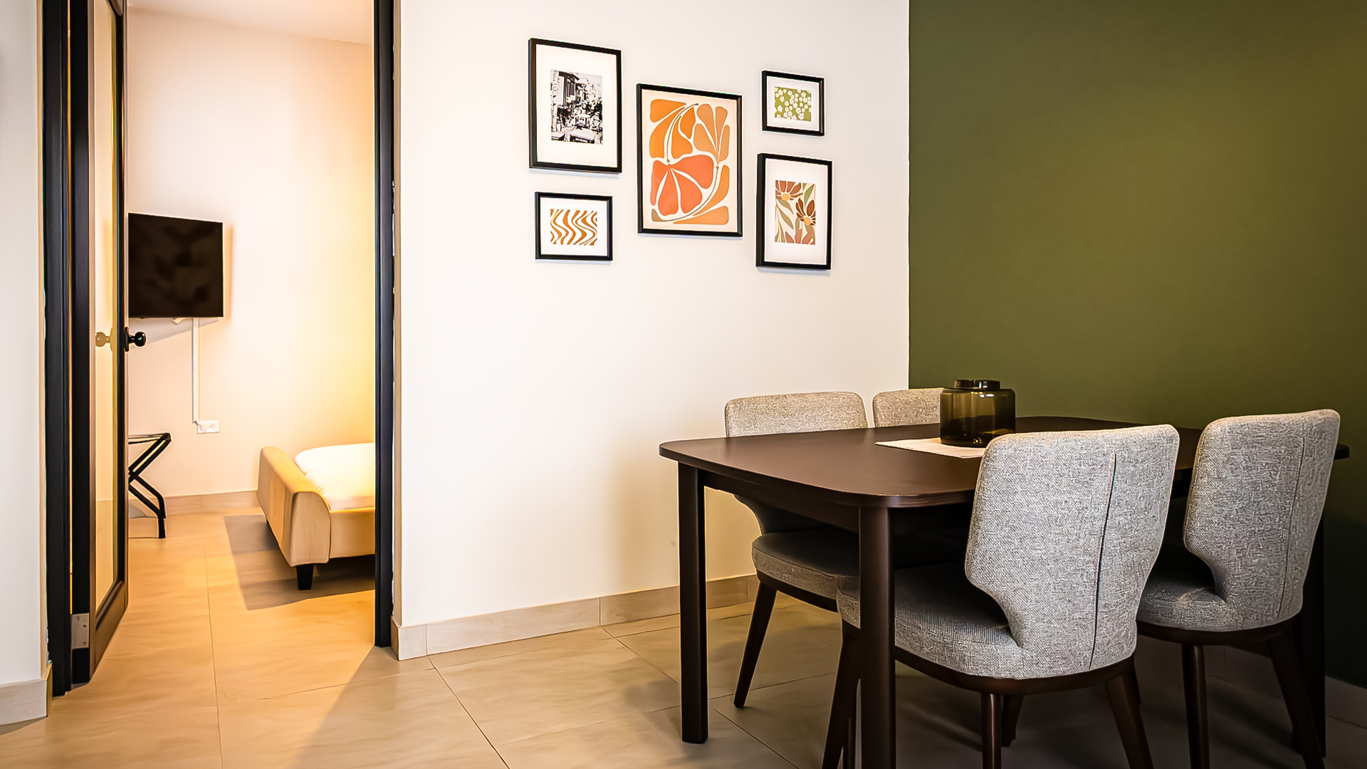 a Minimal dining space with wall art