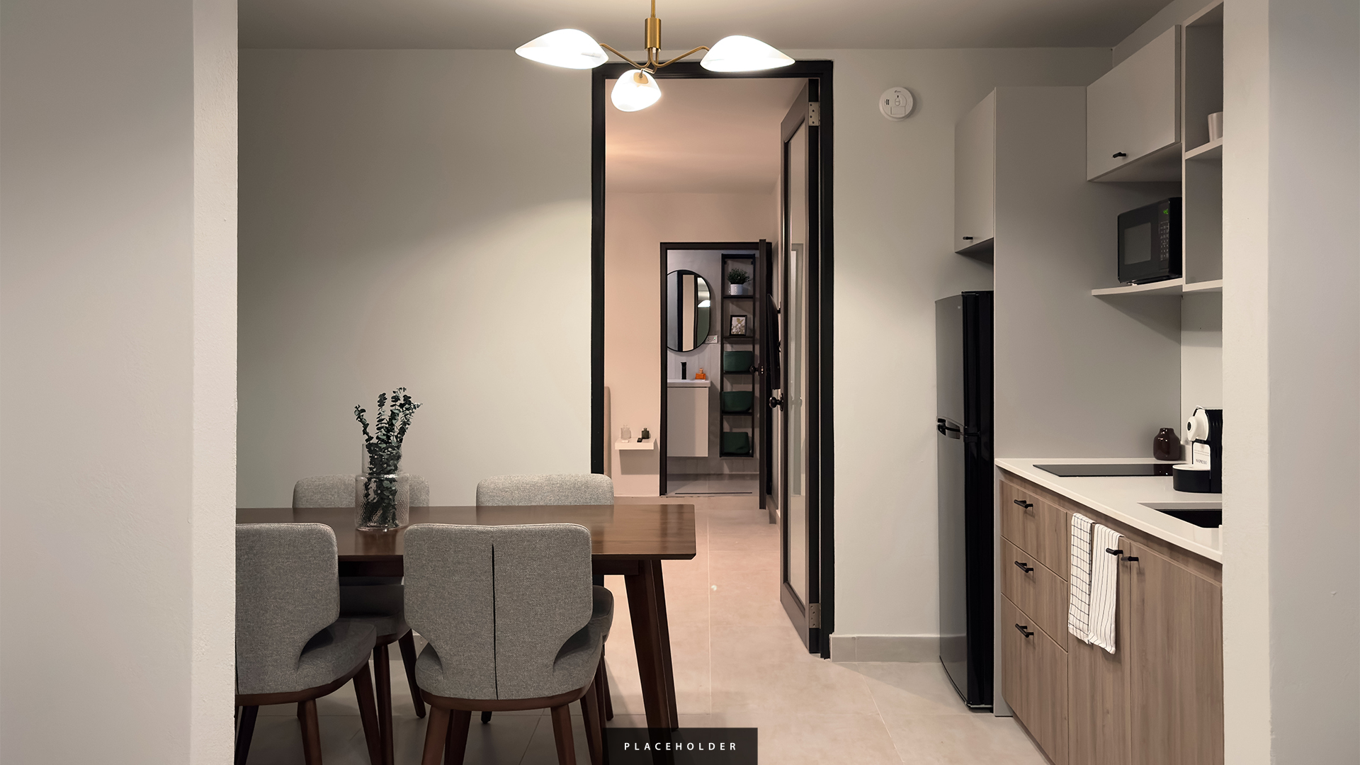 a dining table and chairs in a room