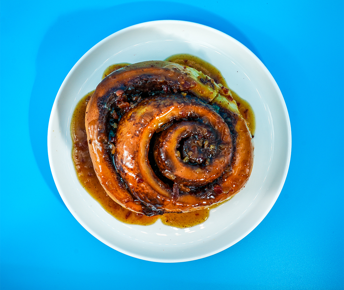 a cinnamon roll on a plate