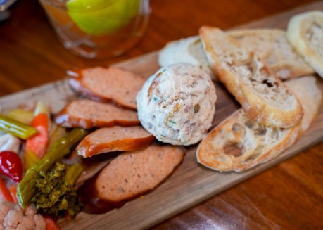 a plate of food on a wood surface
