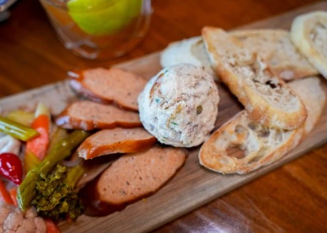 a plate of food on a wood surface