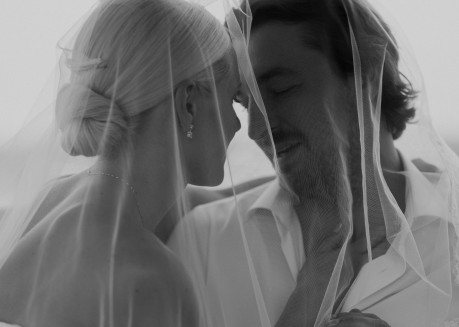 a man and woman in a veil