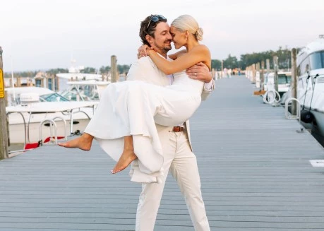 a man holding a woman on his back