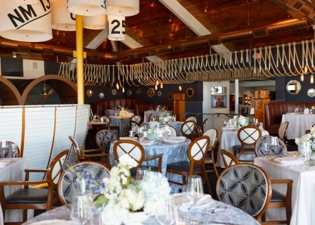 a room with tables and chairs