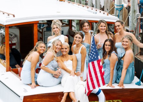 a group of women on a boat