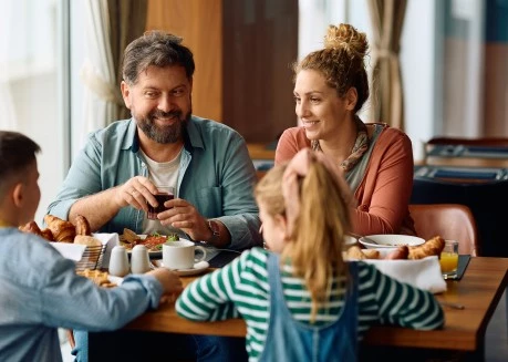 a group of people sitting at a table