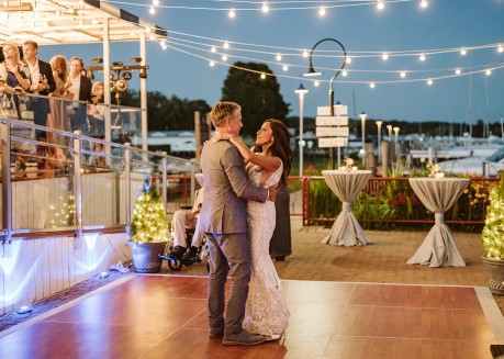 a man and woman dancing on a stage