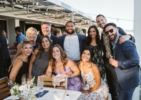 a group of people posing for a photo
