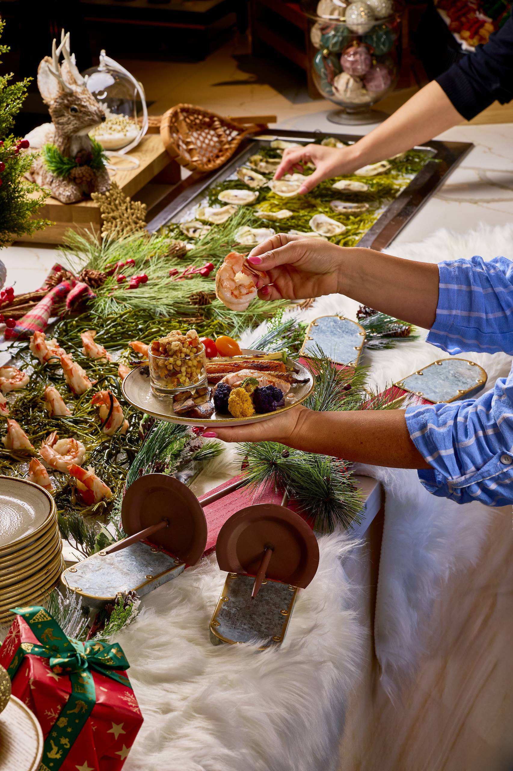 a person holding a plate of food