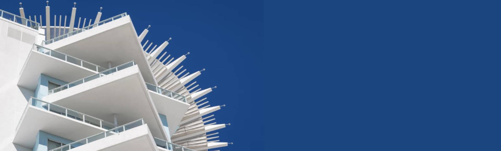 a white building with a blue sky