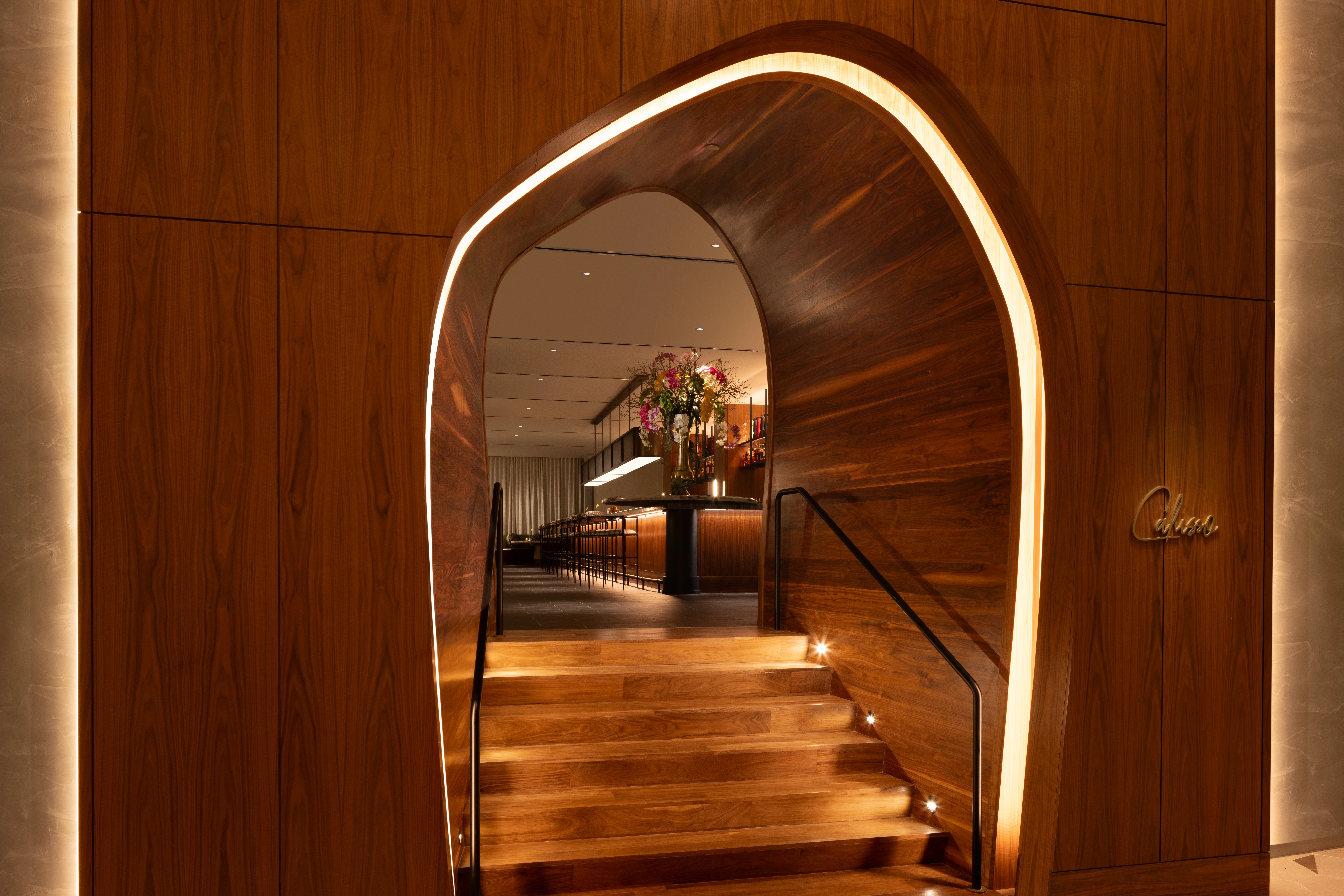 a wooden staircase with lights