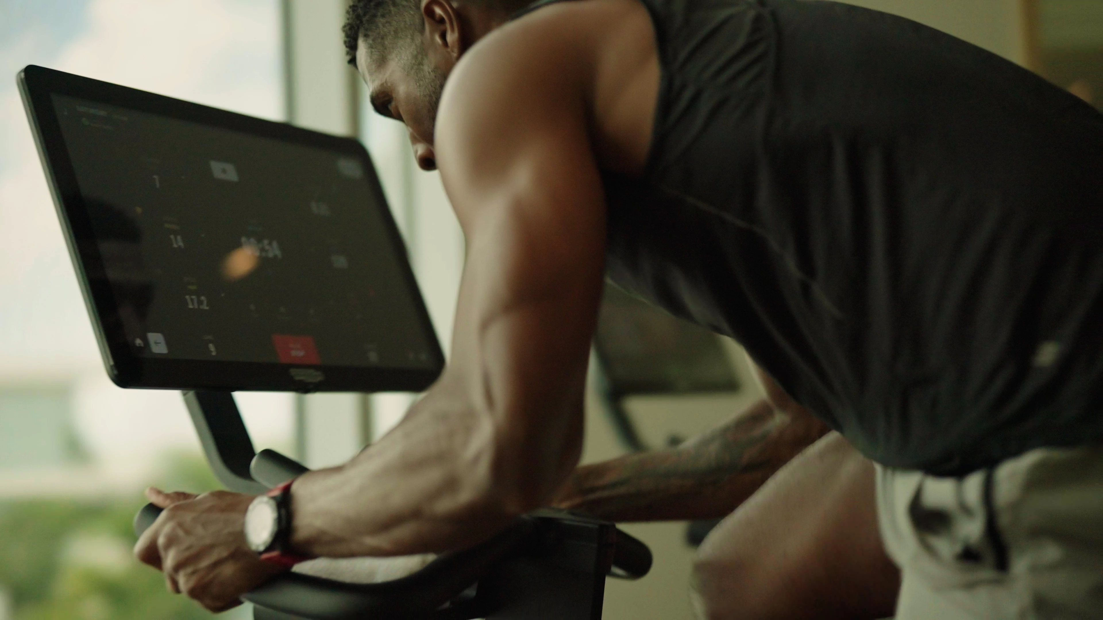 a man on a stationary bike