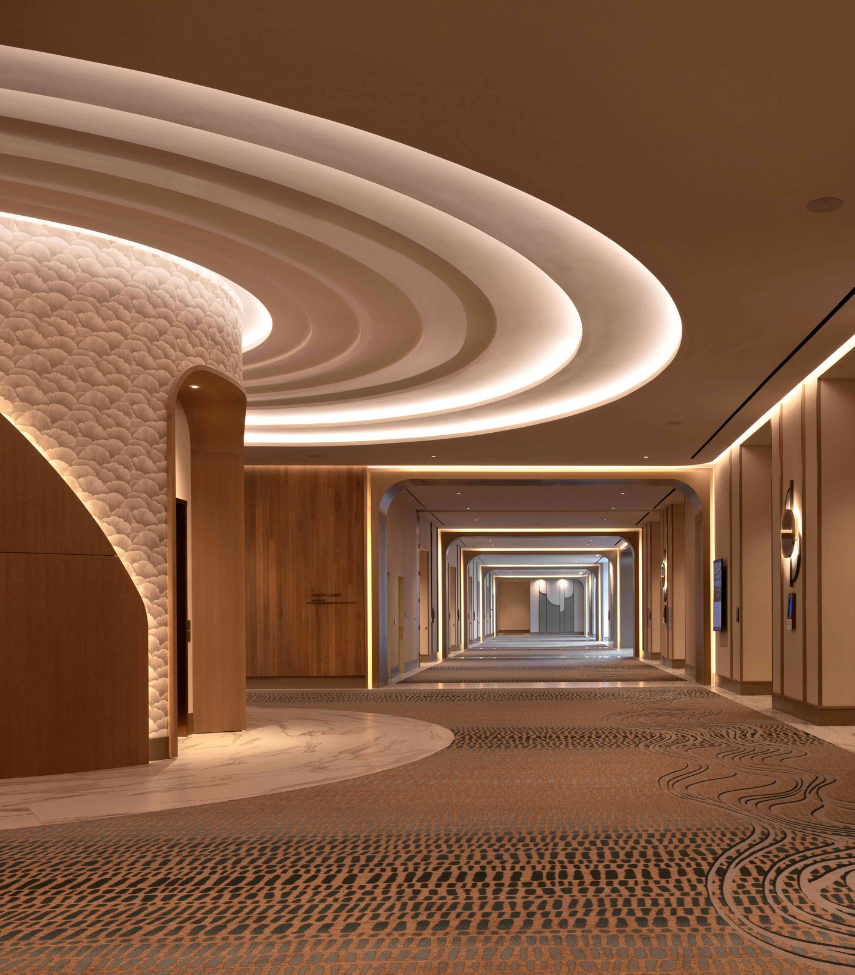 a hallway with lights and a round ceiling
