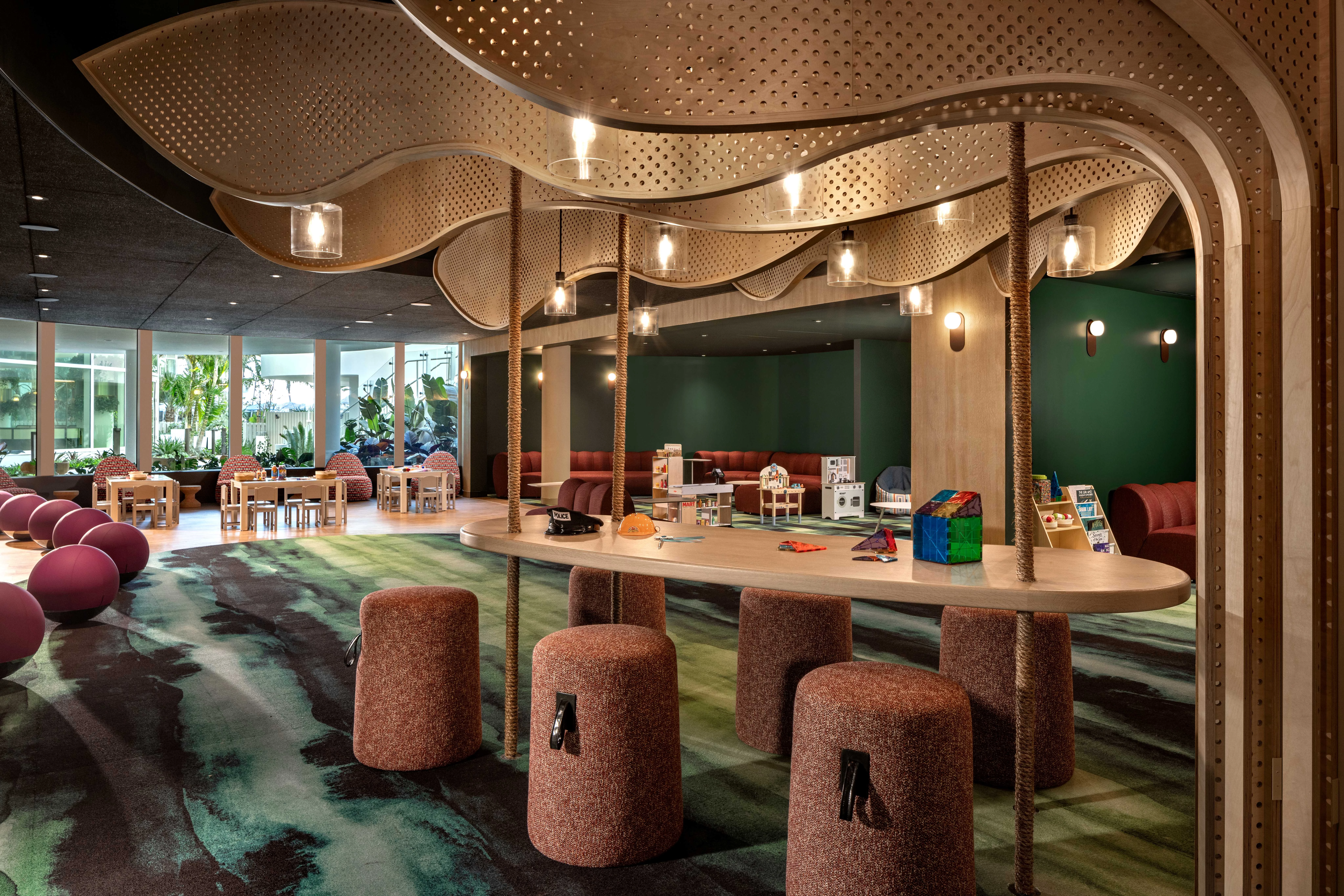 a room with a table and stools