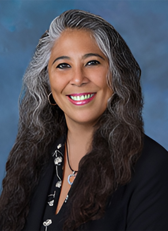 a woman with long hair and a black jacket