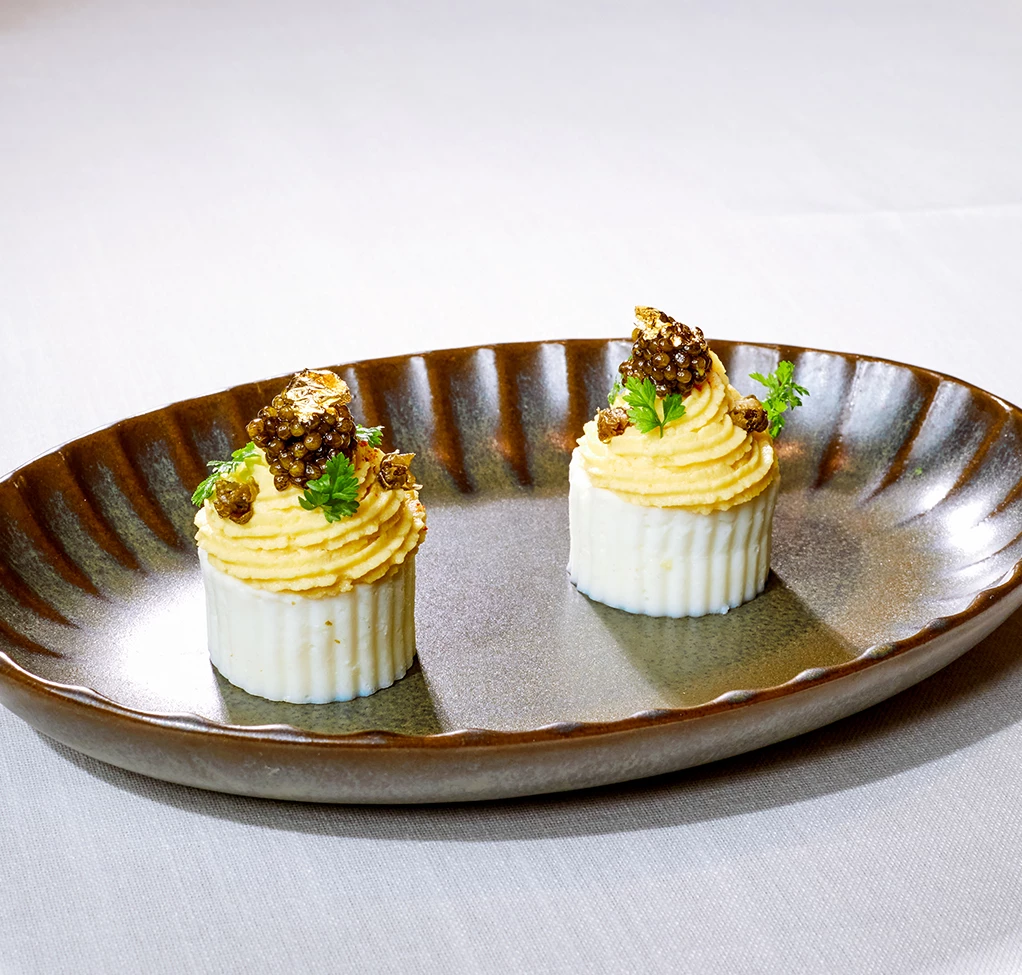 a plate with cupcakes on it