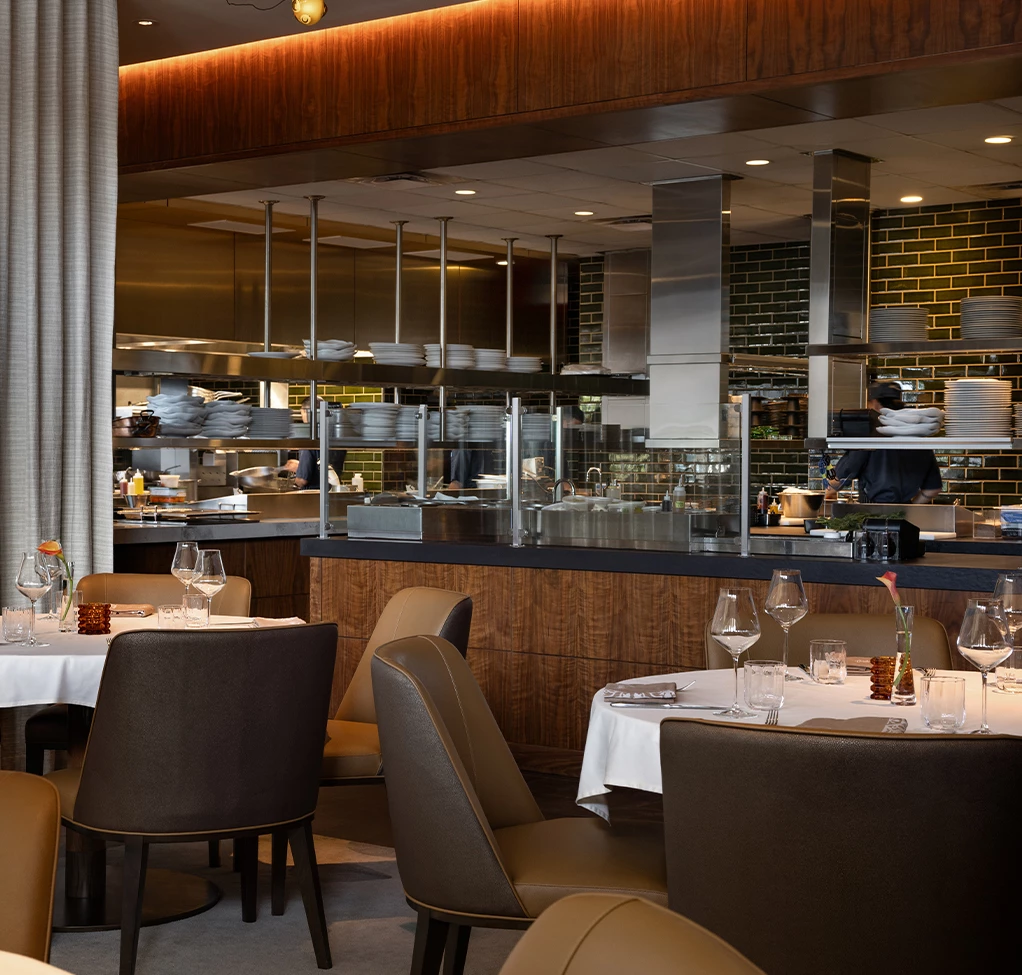 a restaurant with tables and chairs
