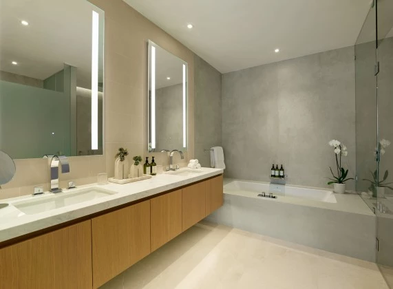 a bathroom with a bathtub and sink