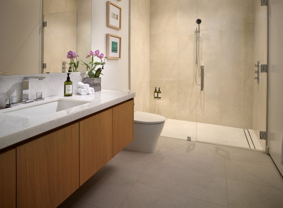 a bathroom with a shower and sink