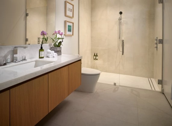 a bathroom with a shower and sink