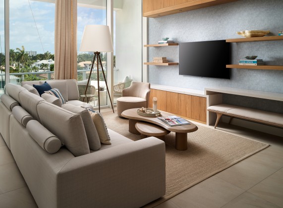 a living room with a television and a couch