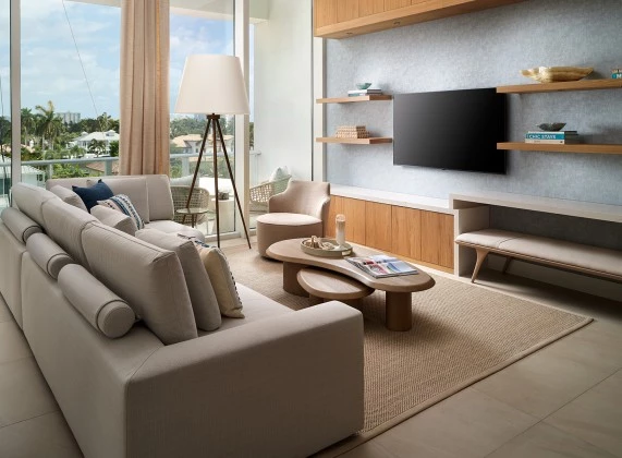 a living room with a television and a couch