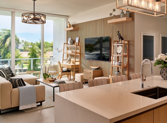 a living room with a tv and a table