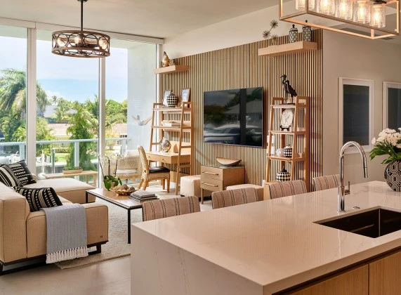 a living room with a tv and a table