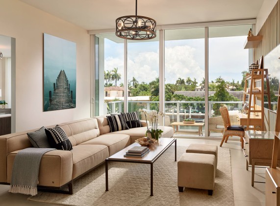 a living room with a couch and a table