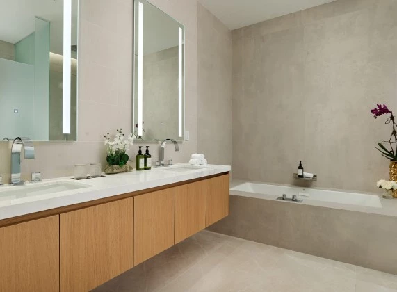 a bathroom with a bathtub and sink