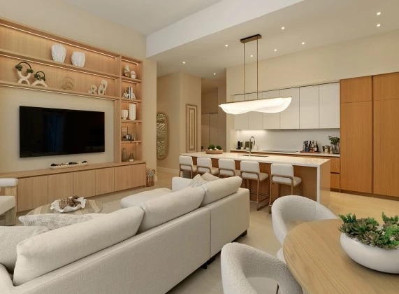a living room with a kitchen and dining area
