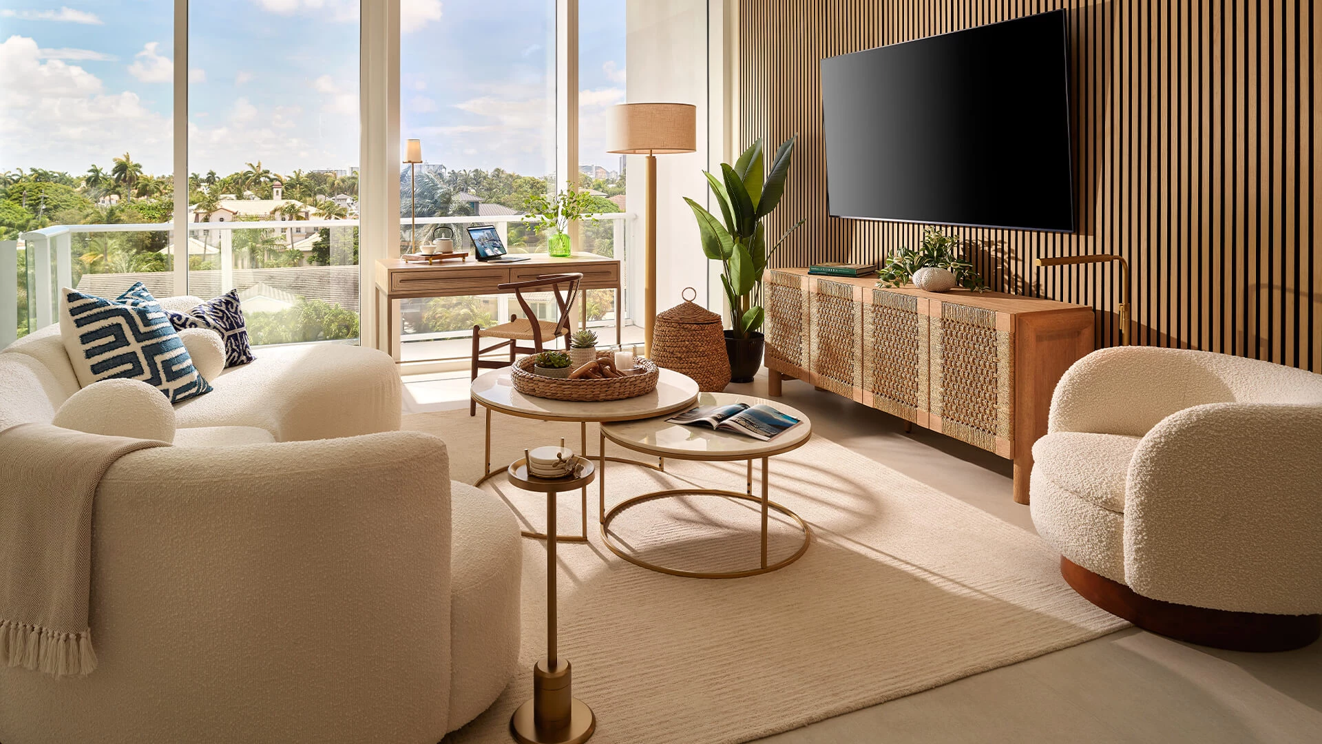 a living room with a television and a table