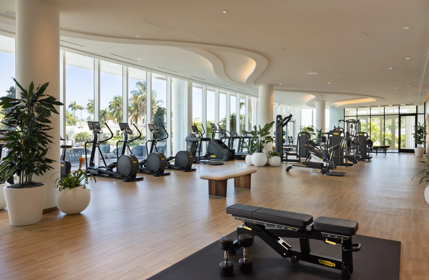 a large gym with exercise equipment