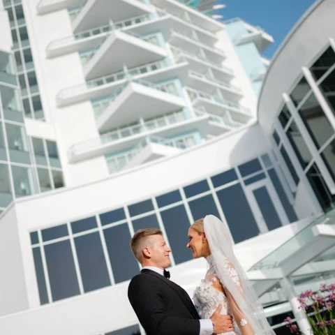 a man and woman in wedding attire