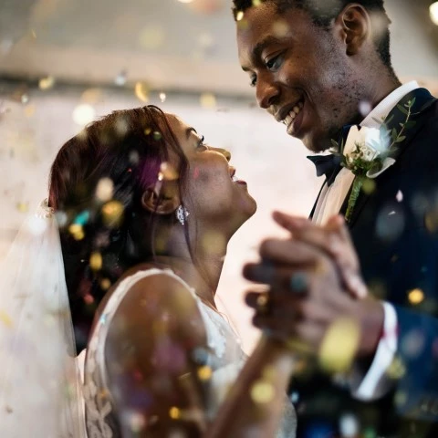 a man and woman slow dancing