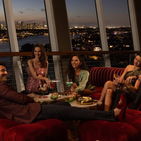 a group of people sitting on a couch