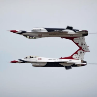 two airplanes in the sky