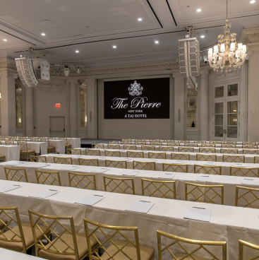 a room with tables and chairs